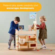 Load image into Gallery viewer, Two children playing with a wooden play kitchen set in a room with educational posters on the wall.