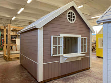 Load image into Gallery viewer, Wooden playhouse with interactive shop window and fold-down counter for pretend storefront play.