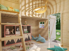 Load image into Gallery viewer, Interior of Little Clubhouse DIY playhouse showing wooden loft, ladder, and cozy children's play area with toys and a whale-shaped cushion by WholeWoodPlayhoyses