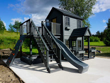 Load image into Gallery viewer, 2- story Black Color Wooden Playhouse Prince with gray slide, climbing wall, wooden terrace and flower boxes by WholeWoodPlayhouses