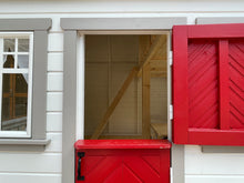 Load image into Gallery viewer, Close- up of open red wooden Dutch door with gray trims by WholeWoodPlayhouses