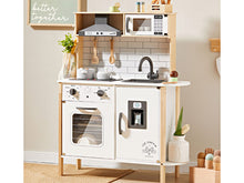 Load image into Gallery viewer, Children's play kitchen set with wooden cabinets, white appliances, and various accessories on a light-colored floor.