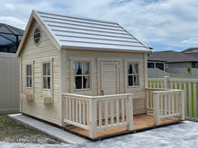 Load image into Gallery viewer, Kids outdoor playhouse in natural wood color with white roof and terrace with railing, assembled outdoors, left side view by Whole woodPlayhouses