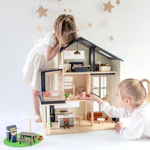 Load image into Gallery viewer, Two children playing with a dollhouse toy set on a white surface.