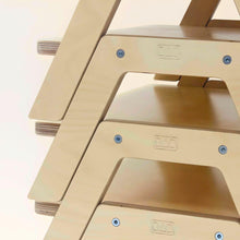 Load image into Gallery viewer, Beige step stools, on the top of each other, with visible branding on a light background