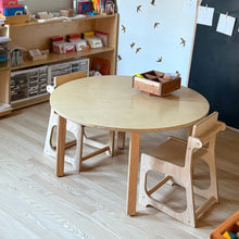 Load image into Gallery viewer, Children's wooden table and chairs in a classroom setting with educational materials.