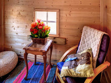 Load image into Gallery viewer, Inside of a Wooden Playhouse DIY Kit Little Clubhouse with little table and armchair by WholeWoodPlayhouses