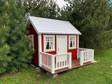 Load image into Gallery viewer, Red Wooden Playhouse Nordic Nario with white roof, wooden terrace and white railing on the backyard by WholeWoodPlayhouses