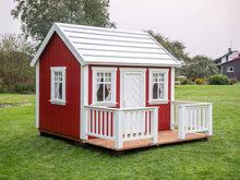 Load image into Gallery viewer, Red Outdoor Kids Playhouse Nordic Nario With White Metal Roof, Pressure Treated Brown Wooden Terrace And White Wooden Railing On Green Lawn by WholeWoodPlayhouses