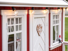 Load image into Gallery viewer, Close up of the front windows and door of Outdoor Kids Playhouse Nordic Nario by WholeWoodPlayhouses
