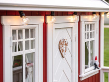 Load image into Gallery viewer, Close up of the front windows and door of Outdoor Kids Playhouse Nordic Nario by WholeWoodPlayhouses