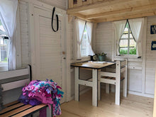 Load image into Gallery viewer, Inside view with kids furniture and curtains of Wooden Playhouse Snowy Owl by WholeWoodPlayhouses