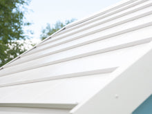 Load image into Gallery viewer, Close Up Of white metal roof Of Kids Wooden Playhouse Bluebird By WholeWoodPlayhouses