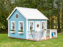 Load image into Gallery viewer, Decorated Wooden Outdoor Playhouse Bluebird with round top window, white flower boxes, Wooden Terrace and White Wooden Railing by WholeWoodPlayhouses