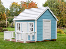 Load image into Gallery viewer, Blue and White Outdoor Playhouse Bluebird with White Roof,  two doors and Wooden Terrace in Blue Outdoor Kids Playhouse Bluebird, White Woof, Blue Walls, Wooden Terrace And White Railing on Green Lawn by WholeWoodPlayhouses backyard by WholeWoodPlayhouses