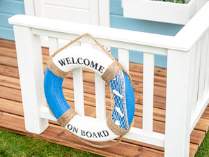 Close Up Of The Wooden porch white railing with lifebuoy Of Kids Wooden Playhouse Bluebird By WholeWoodPlayhouses