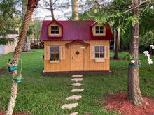 Load image into Gallery viewer, Outside Assembled Wooden Farmhouse Style Kids Outdoor Playhouse DIY Kit Little Farmhouse With Natural color Walls and red roof with small windows in the Backyard by WholeWoodPlayhouses