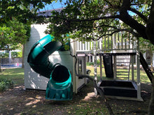 Load image into Gallery viewer, 2-Story Kids Playhouse Prince close up of dark green spiral slide in the backside by WholeWoodPlayhouses