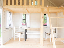 Load image into Gallery viewer, Inside view with kids furniture,curtains and loft of Wooden Playhouse Arctic Auk by WholeWoodPlayhouses