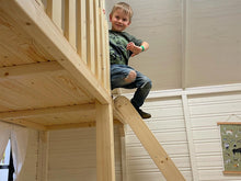 Load image into Gallery viewer, Boy Playing Inside on the Loft in Wooden Playhouse Arctic Auk by WholeWoodPlayhouses