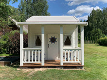 Load image into Gallery viewer, White and blue Kids Wooden Playhouse Countryside with covered wooden porch and two opening windows in front on green lawn by WholeWoodPlayhouses