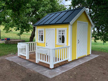 Load image into Gallery viewer, Yellow Wooden Playhouse with white fishbone doors and wooden terrace with white railing in the backyard by WholeWoodPlayhouses