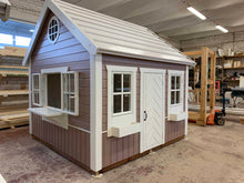 Load image into Gallery viewer, Handcrafted playhouse with added shop window, perfect for imaginative play and realistic roleplay.
