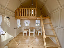 Load image into Gallery viewer, Wooden Playhouse interior with loft, table, and furniture set for kids by WholeWoodPlayhouses

