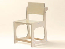 Load image into Gallery viewer, Wooden chair on a beige background
