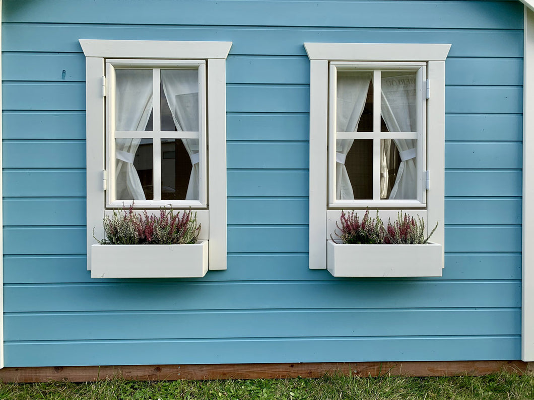 Two window and two flower boxes with plants on a blue wooden wall by WholeWoodPlayhouses