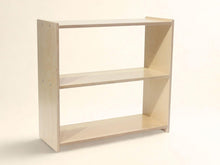 Load image into Gallery viewer, Beige bookshelf with two shelves on a beige background
