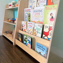 Load image into Gallery viewer, Wooden bookshelf with children's books on a wooden floor.
