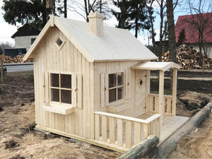 Outside of assembled wooden kids playhouse DIY Kit Little Cottage | outdoor playhouse DIY kit by WholeWoodPlayhouses