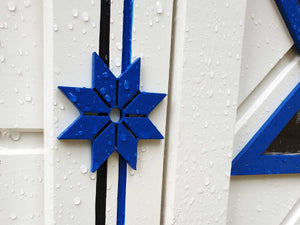 A blue cornflower, part of decoration of Kids Playhouse Cornflower by WholeWoodPlayhouses