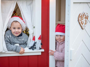 Kids waiting for Santa Claus inside Kids Playhouse Nordic Nario| red Outdoor Playhouse by WholeWoodPlayhouses