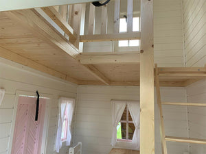 2-Story wooden playhouse Princess inside view with a ladder to upper floor by WholeWoodPlayhouses