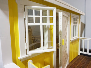 Beautiful handcrafted wooden windows of Outdoor Kids Playhouse Sunshine by WholeWoodPlayhouses