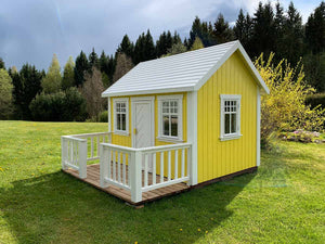 Yellow Outdoor Kids Playhouse Sunshine with a terrace and white fence by WholeWoodPlayhouses