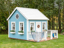 Load image into Gallery viewer, Decorated Wooden Outdoor Playhouse Bluebird with round top window, white flower boxes, Wooden Terrace and White Wooden Railing by WholeWoodPlayhouses
