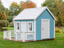 Load image into Gallery viewer, Blue and White Outdoor Playhouse Bluebird with White Roof,  two doors and Wooden Terrace in Blue Outdoor Kids Playhouse Bluebird, White Woof, Blue Walls, Wooden Terrace And White Railing on Green Lawn by WholeWoodPlayhouses backyard by WholeWoodPlayhouses
