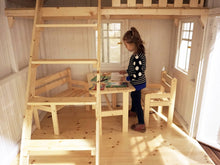 Load image into Gallery viewer, A kid playing inside of a Wooden Outdoor Playhouse Sunshine with a loft by WholeWoodPlayhouses
