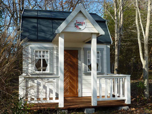 Kids Playhouse Grand Farmhouse White and Light Gray Outdoor Playhouse With Terrace And White Railings, Brown Fishbone Style Wooden Door by WholeWoodPlayhouses