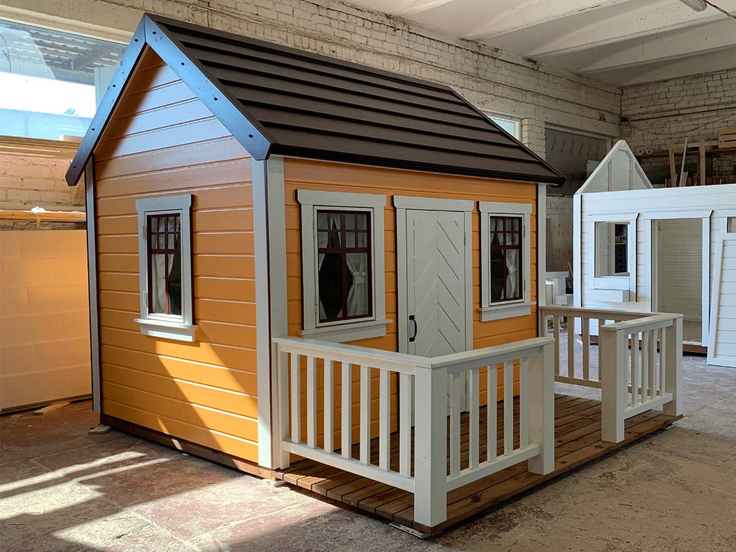 Orange Outdoor Kids Playhouse Papaya with  brown roof and a porch  with white railings by WholeWoodPlayhouses
