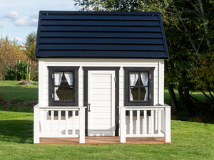  Kids Wooden Playhouse Blackbird from Front with  Black metal roof and black Flower boxes and wooden terrace by WholeWoodPlayhouses