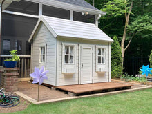 Load image into Gallery viewer, Wooden Playhouse Arctic Nario with white metal roof and white flower boxes with black trims in a backyard by WholeWoodPlayhouses
