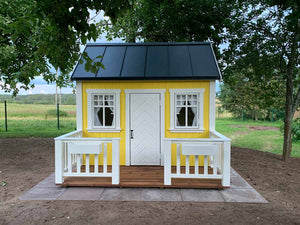 Front outside view of yellow Outdoor Kids Playhouse Sunshine with black roof by WholeWoodPlayhouses